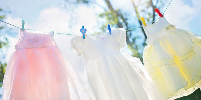 Clean dresses on a washing line