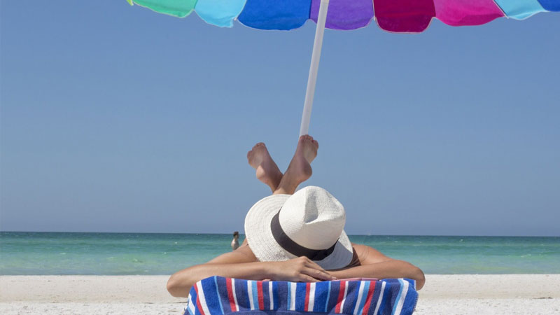 Beach Umbrella and Sunscreen Time